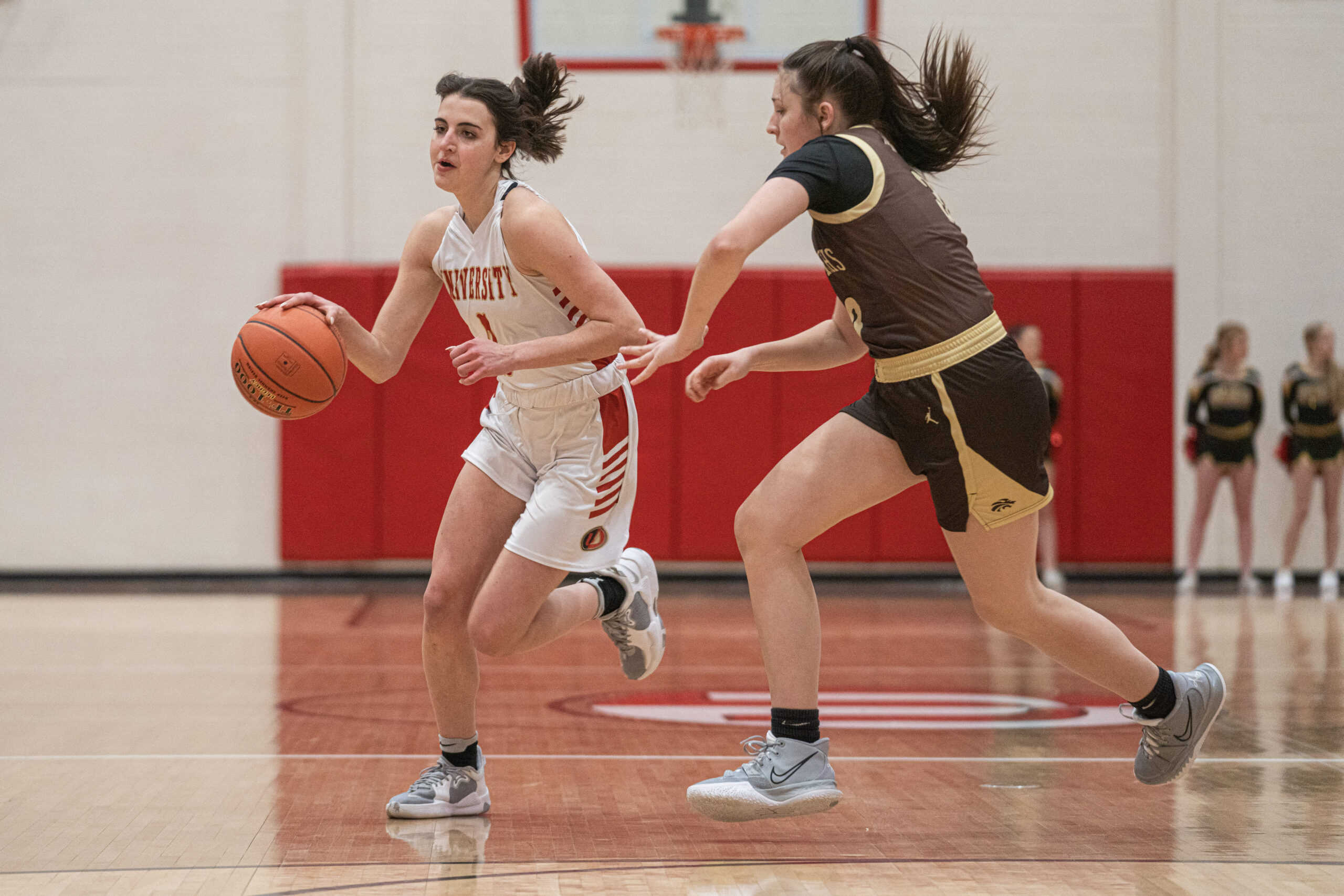 University girls improve to 3-0 with 66-50 win over John Marshall